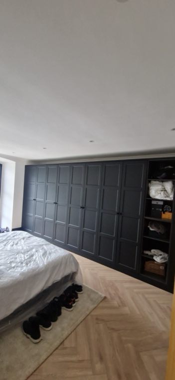 Bespoke fitted wardrobes in a bedroom