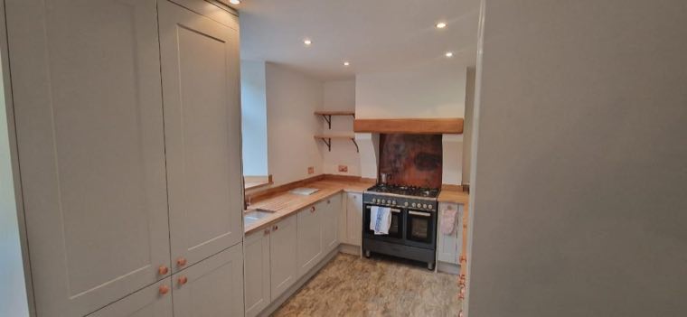 Shaker kitchen with copper handles