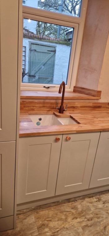 Kitchen sink and tap