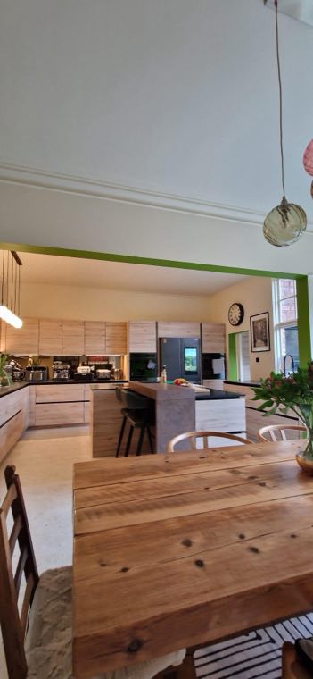 Light oak kitchen with concrete effect island fitted by Kitchen King